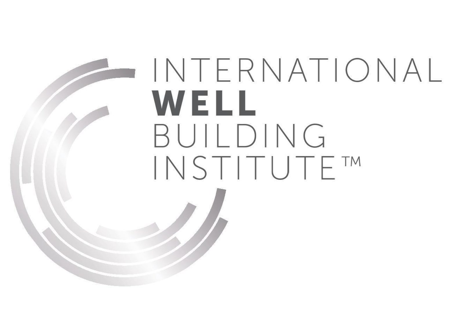 A silver semi-circle logo next to the words "International Well Building Institute" on a white background.