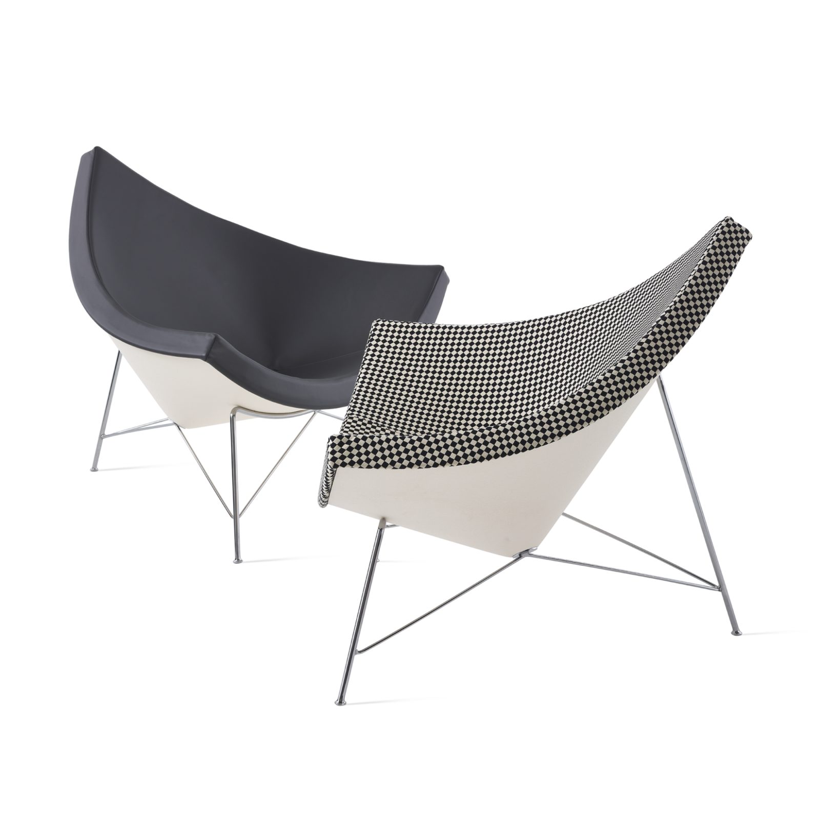 Two Nelson Coconut Lounge Chairs, one black leather and one black and white checkered, facing each other on a white background.