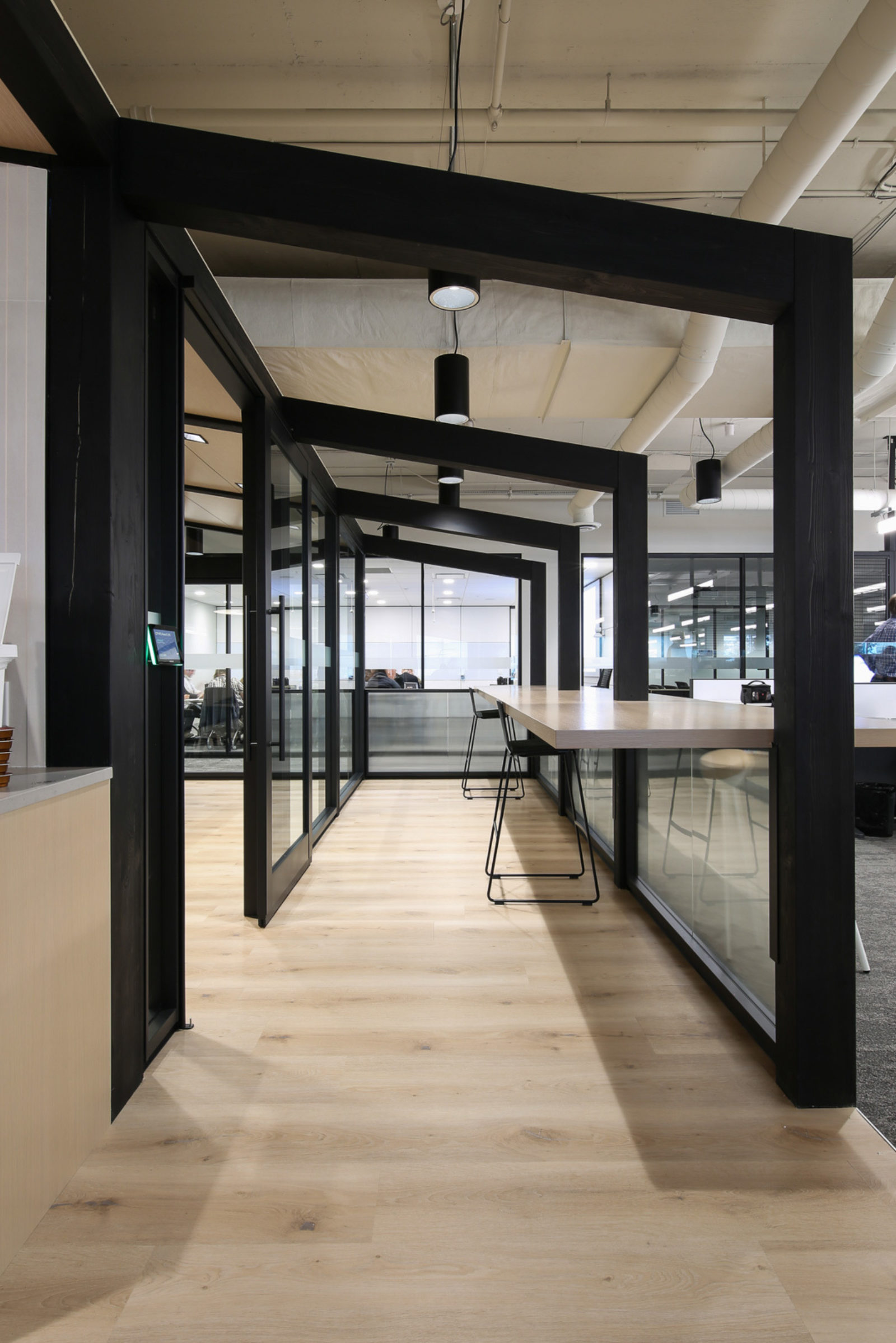 A hallway created with DIRTT metal awnings.